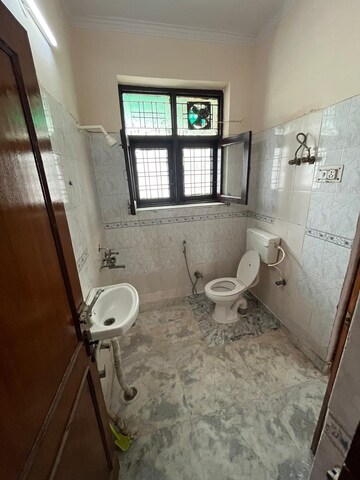 Bathroom in 3 BHK Builder Floor at Green Fields Colony – for Rent