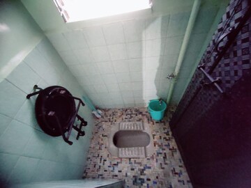 Bathroom in 2 BHK Apartment at Madhumita Apartment Gururaj Society, Kothrud – for Rent