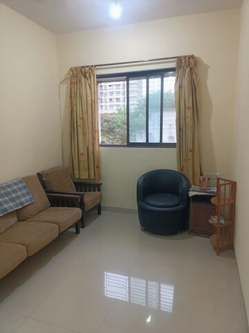 Living Room in 1 BHK Apartment at Hindmata CHS, Dadar East – for Rent