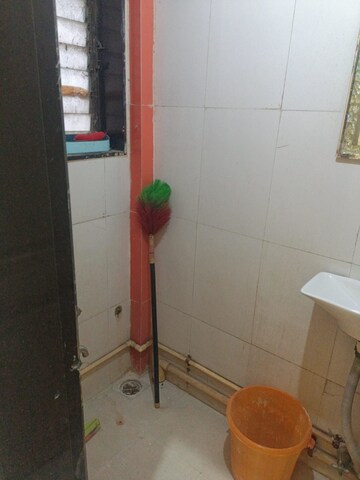 Bathroom in 1 BHK Apartment at Hindmata CHS, Dadar East – for Rent