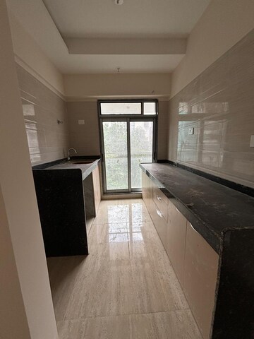 Kitchen in 2 BHK Apartment at Je And Vee Om Trimurti, Malad East – for Rent