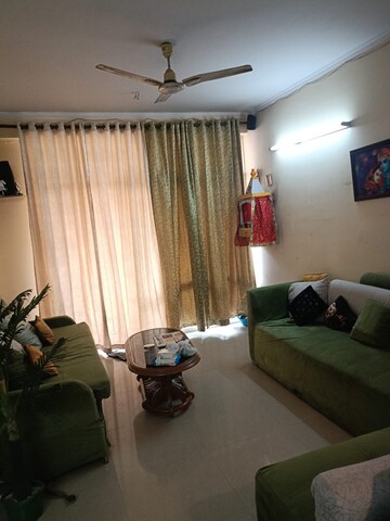 Living Room in 2 BHK Apartment at JKG Palm Resort, Raj Nagar Extension – for Rent