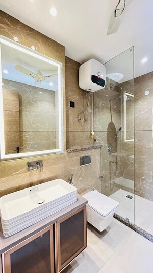 Bathroom in 4 BHK Builder Floor at Ansal Sushant Floors, Sushant Lok ii – for Sale