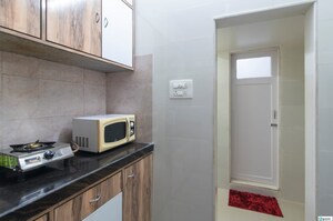Kitchen in 1 BHK Apartment at Lalani Grandeur, Goregaon East – for Sale