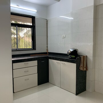 Kitchen in 2 BHK Apartment at Aditya New Ekta CHS LTD, Babhai Naka – for Sale