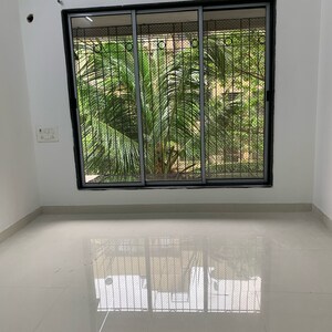 Room in 2 BHK Apartment at Aditya New Ekta CHS LTD, Babhai Naka – for Sale
