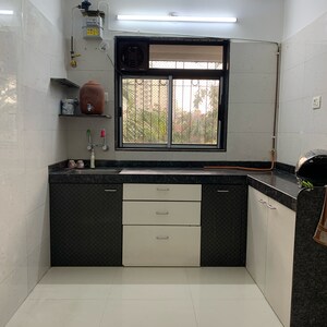 Kitchen in 2 BHK Apartment at Aditya New Ekta CHS LTD, Babhai Naka – for Sale