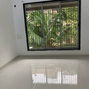 Room in 2 BHK Apartment at Aditya New Ekta CHS LTD, Babhai Naka – for Sale