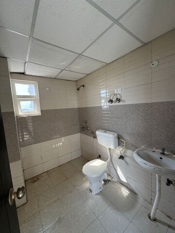 Bathroom in 2.5 BHK Apartment at Signature Global Grand Iva, Sector 103 – for Rent