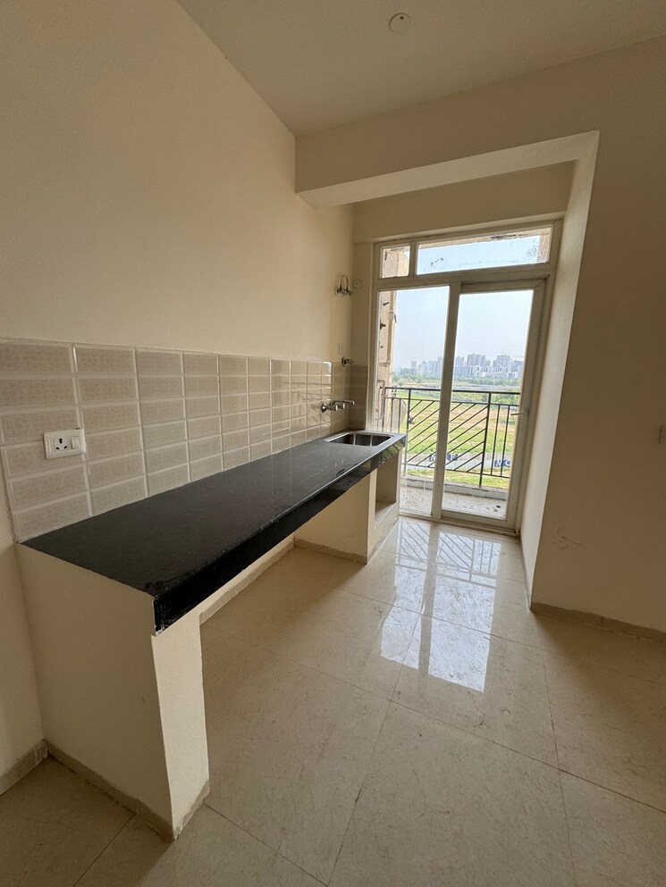 Kitchen, signature-global-grand-iva 2.5 Bedroom 645 Sq.Ft. Apartment In Sector 103 Gurgaon 8931318