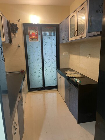 Kitchen in 2 BHK Apartment at Mahavir Heritage CHS, Kharghar Sector 35g – for Rent