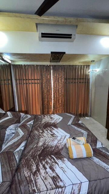 Bedroom in 2 BHK Apartment at Rohit Apartments, Andheri West – for Rent