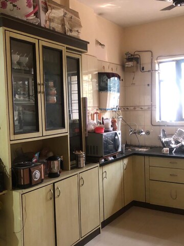 Kitchen in 2 BHK Apartment at Atharva Garden, Kharadi – for Rent