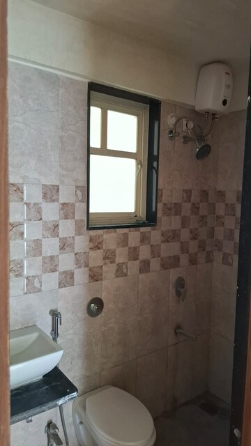 Bathroom in 2 BHK Apartment at Kohinoor Tinsel County, Hinjewadi – for Sale