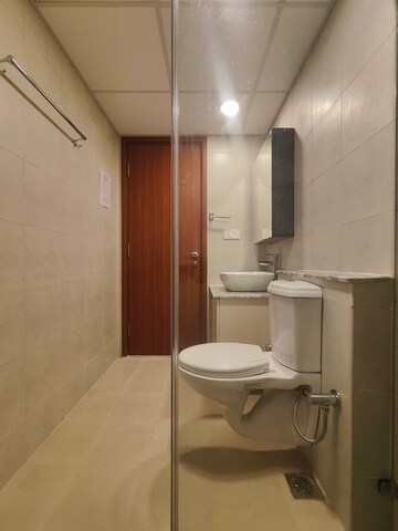 Bathroom in 2 BHK Apartment at Bhartiya Nikoo Homes Phase 2, Thanisandra Main Road – for Rent