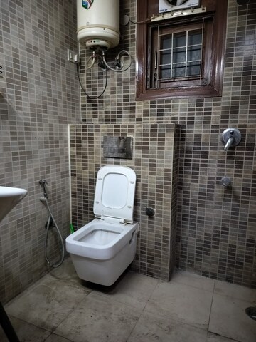 Bathroom in 1 BHK Apartment at Palm Residency Chhatarpur, Chattarpur – for Rent