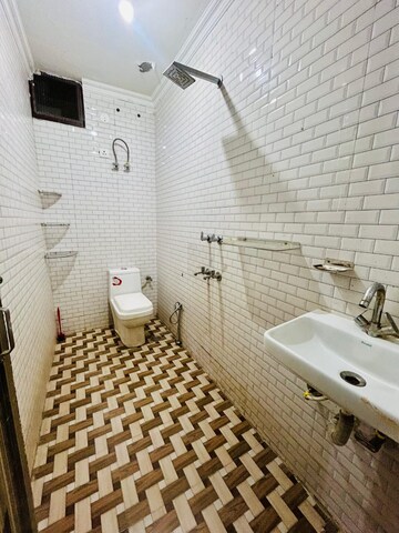 Bathroom in 1 BHK Apartment at Palm Residency Chhatarpur, Chattarpur – for Rent