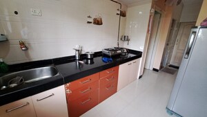 Kitchen in 1 BHK Apartment at Cosmos Heritage, Manpada – for Sale