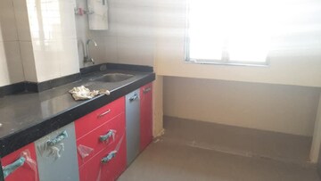 Kitchen in 2 BHK Apartment at Laxmi Avenue D Global City Ph-1, Virar West – for Rent