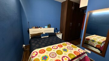 Bedroom in 3.5 BHK Builder Floor at Emaar The Palm Drive-Palm Studios, Sector 66 – for Sale