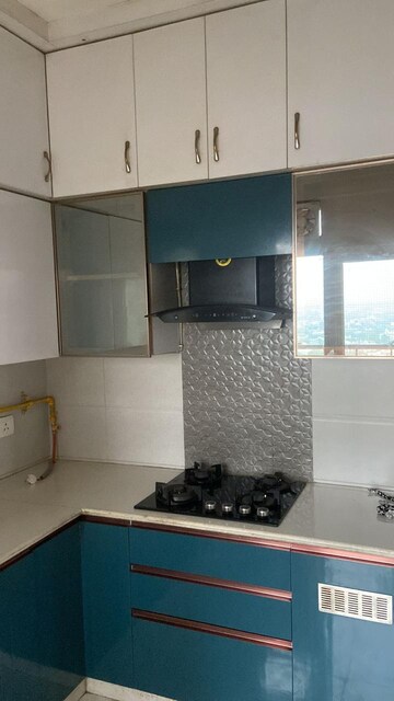 Kitchen in 2 BHK Apartment at Ajnara Ambrosia, Sector 118 – for Rent
