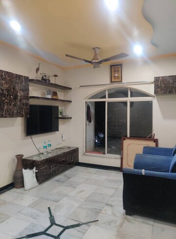Living Room in 2 BHK Apartment at Palace Orchard CHS, Mohammadwadi – for Rent