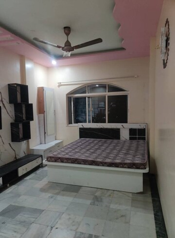 Bedroom in 2 BHK Apartment at Palace Orchard CHS, Mohammadwadi – for Rent