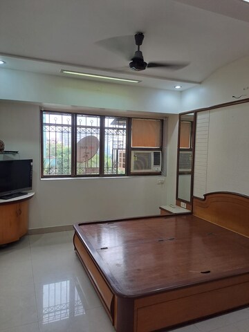 Bedroom in 3 BHK Apartment at Royal Classic Co Op Society, Andheri West – for Rent
