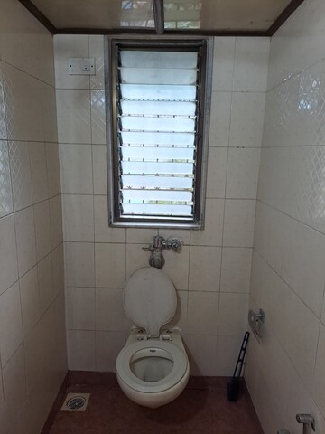 Bathroom in 3 BHK Apartment at Royal Classic Co Op Society, Andheri West – for Rent
