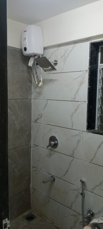 Bathroom in 1 BHK Apartment at Bindra Complex, Andheri East – for Rent