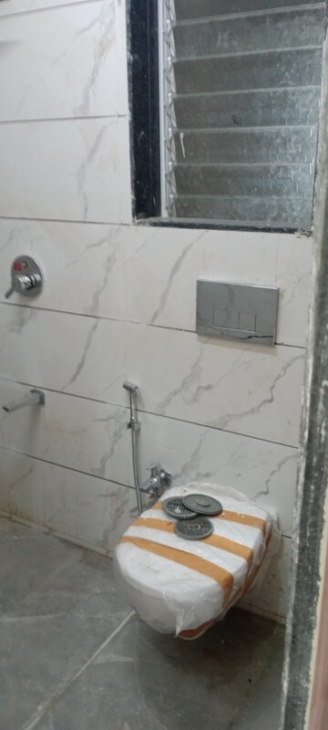 Bathroom in 1 BHK Apartment at Bindra Complex, Andheri East – for Rent