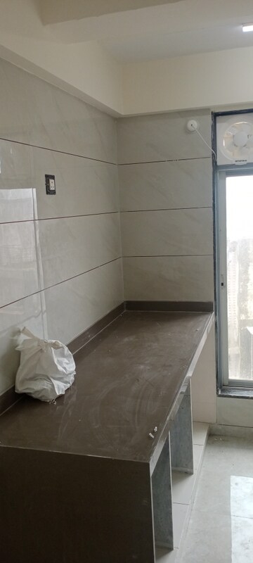 Bathroom in 1 BHK Apartment at Bindra Complex, Andheri East – for Rent