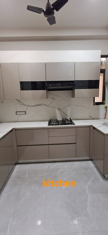 Kitchen in 3 BHK Builder Floor at Gyan Khand I – for Sale