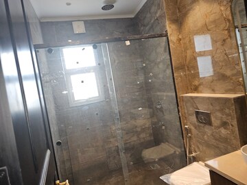 Bathroom in 4 BHK Builder Floor at Surajmal Vihar – for Sale
