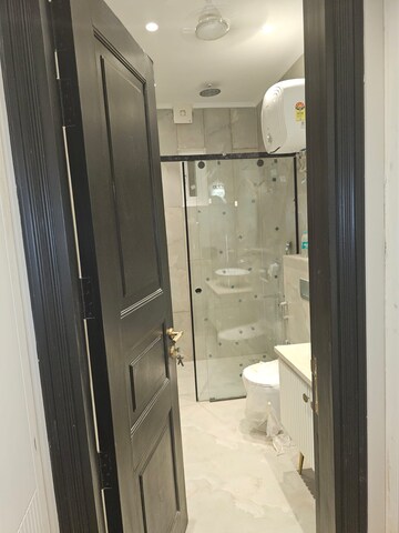 Bathroom in 4 BHK Builder Floor at Surajmal Vihar – for Sale
