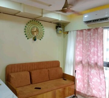Living Room in 1 BHK Apartment at Lodha Crown Quality Homes, Majiwada – for Rent