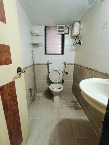 Bathroom in 1 BHK Apartment at Charkop Sector 9 – for Sale