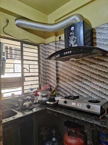 Kitchen in 2 BHK Apartment at Surya Apartments, Rajpur Sonarpur – for Sale