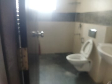 Bathroom in 3 BHK Apartment at Imperial Navkis Celeste, Rmv Extension – for Rent