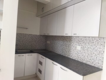 Kitchen in 3 BHK Apartment at Imperial Navkis Celeste, Rmv Extension – for Rent