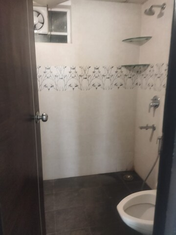 Bathroom in 3 BHK Apartment at Imperial Navkis Celeste, Rmv Extension – for Rent