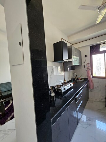 Kitchen in 2 BHK Apartment at Dev Leo Tower, Oshiwara – for Rent