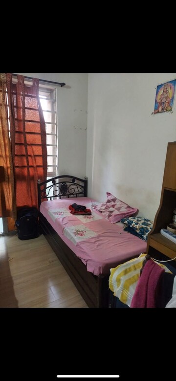 Bedroom in 2 BHK Apartment at Sheth Vasant Lawns, Laxmi Nagar – for Rent