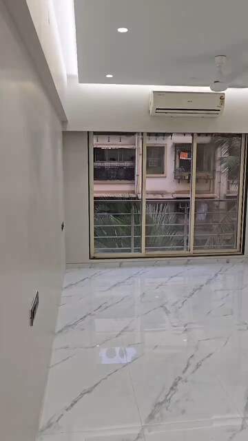 Room in 2 BHK Apartment at Lovely CHS, Andheri West – for Rent