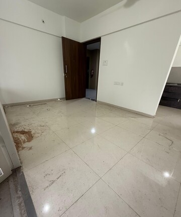 Living Room in 1 BHK Apartment at Divine Palm Springs, Wakad – for Rent