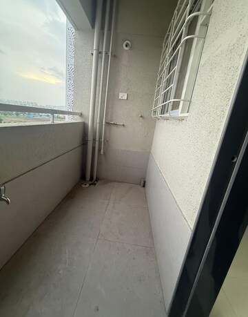 Utility Room in 1 BHK Apartment at Divine Palm Springs, Wakad – for Rent