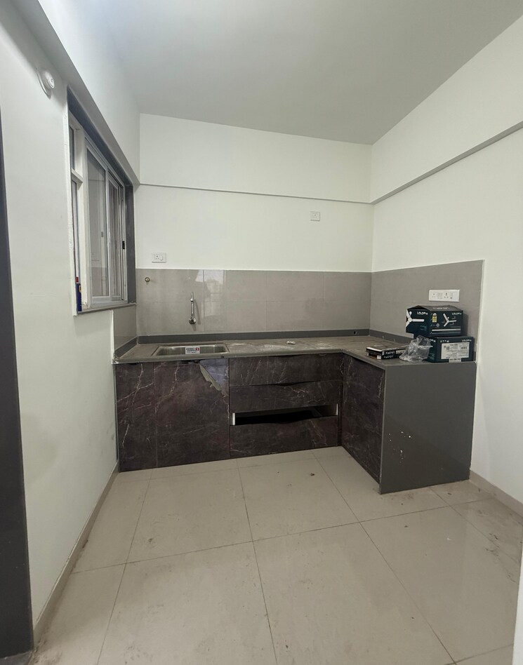 Kitchen, divine-palm-springs 1 Bedroom 610 Sq.Ft. Apartment In Wakad Pune 8932552