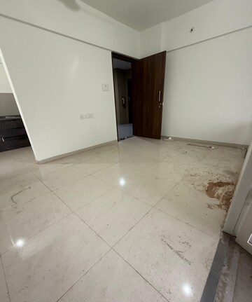 Living Room in 1 BHK Apartment at Divine Palm Springs, Wakad – for Rent