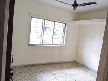 Bedroom in 2 BHK Apartment at Abhishekh Apartment Happy Colony, Kothrud – for Rent