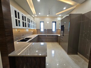 Kitchen in 4 BHK Builder Floor at Parklands, Sector 85 – for Sale